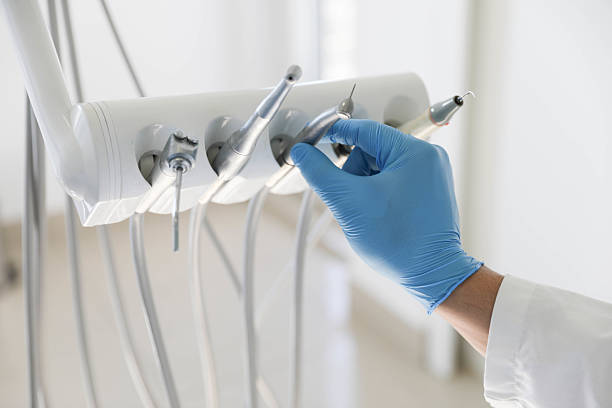 Professional Tooth Extraction technician working in Parsippany, NJ